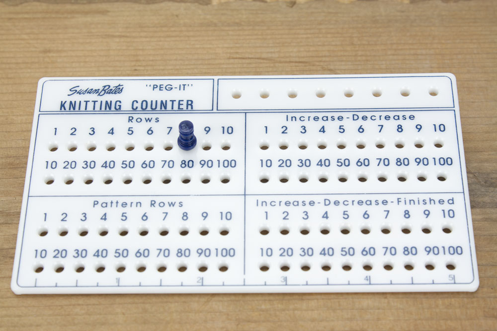 Place a peg in the hole corresponding to the row number you've just completed.