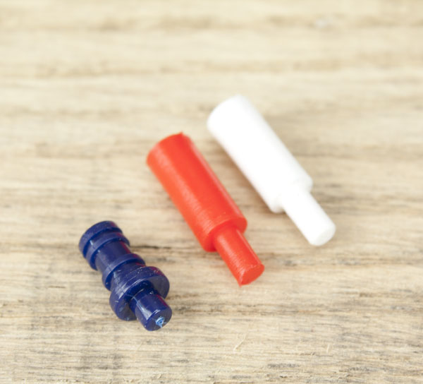 Blue peg from Susan Bates Pet It with replacement peg alternatives.